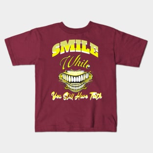 smile while you still have teeth Kids T-Shirt